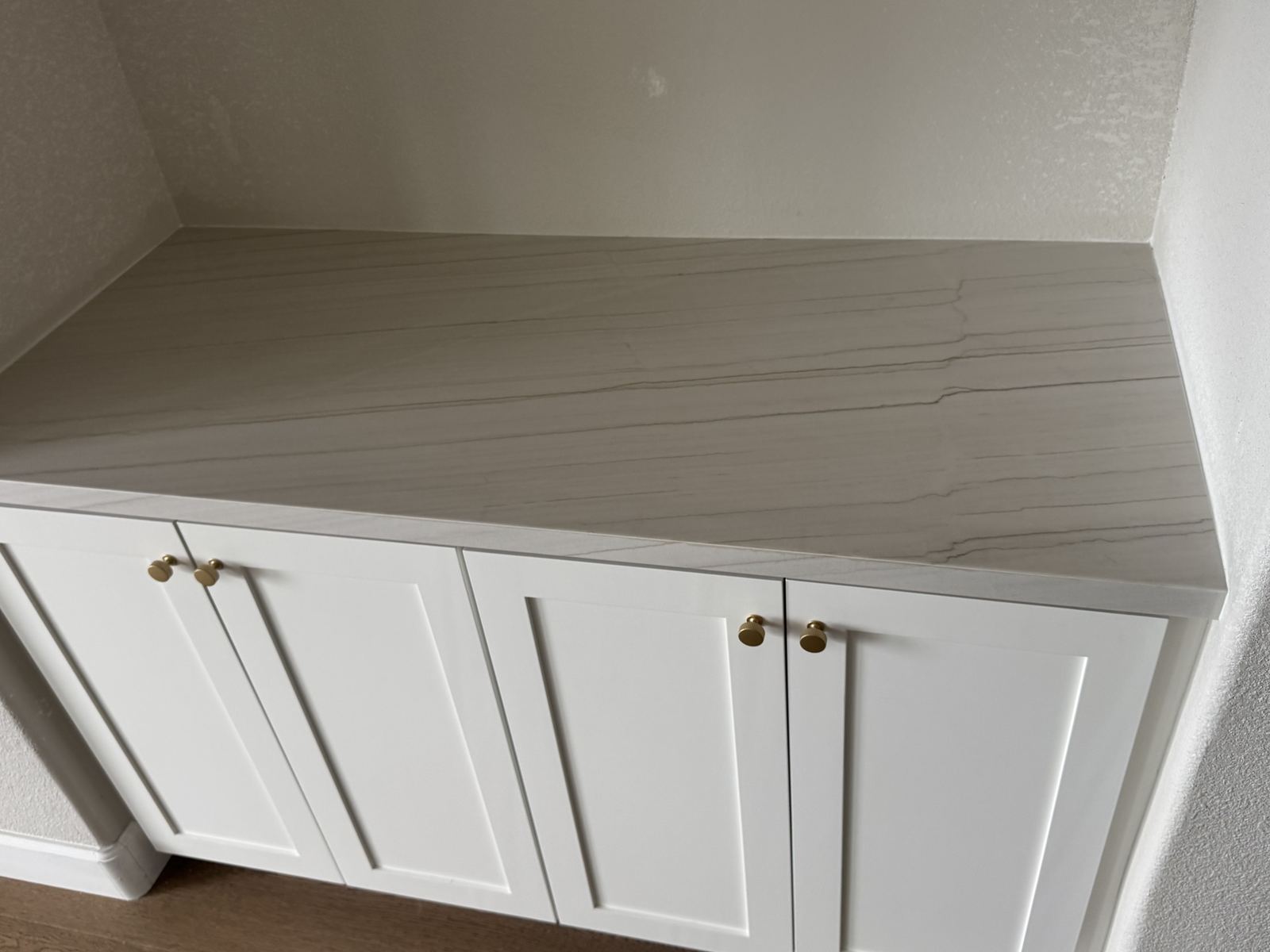 Built-in cabinet top, honed finish — commercial countertop installation