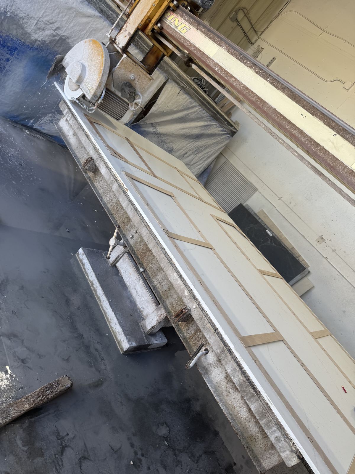 On the bridge saw — every cut from template — countertop fabrication process